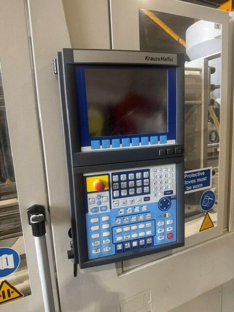 Used KRAUSS MAFFEI CX 110-380 injection moulding machine