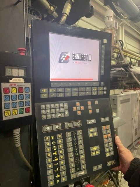 Used SANDRETTO  MEGA HES injection moulding machine