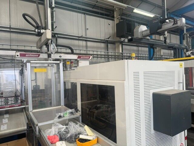 Used NEGRI BOSSI CANBIO 1300H-400 injection moulding machine