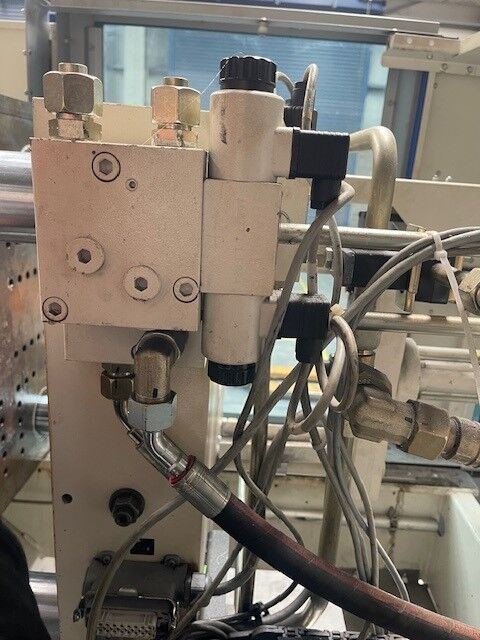 Used KRAUSS MAFFEI CX 80-380 injection moulding machine