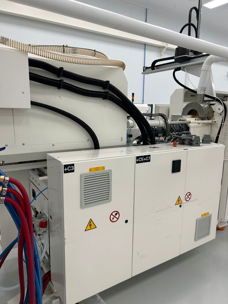 Used KRAUSS MAFFEI PX  160-750 injection moulding machine